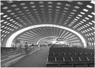 Прямая эллиптическая цилиндрическая поверхность – секция Е терминала аэропорта им. Ш. де Голля. Франция, г. Париж.