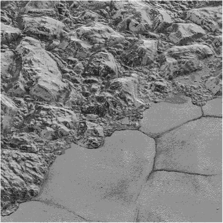 Многоугольные конвективные ячейки в азотном льду Равнины Спутника на границе с горной областью (Фото.